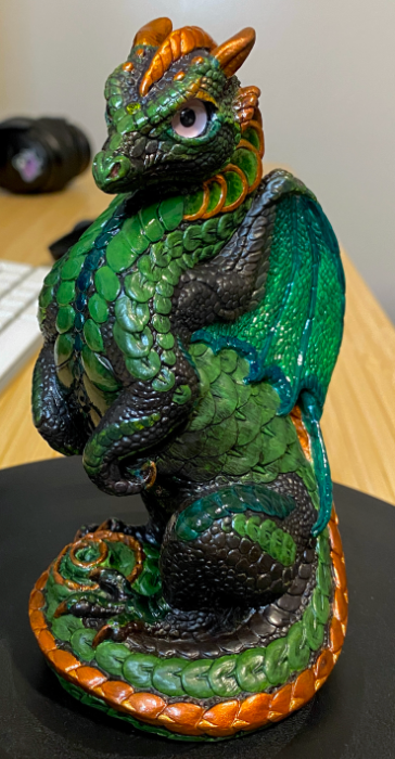 Windstone_forest_sm A Windstone dragon custom paint job with a forest theme. A PYO young dragon statue painted in blacks and greens with copper scale details, some dark wash for natural texturing, and lavender glass eyes, sealed with a variety of matte and gloss textures.